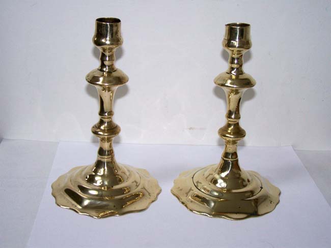 A nice pair of Georgian Scallop base BrassCandlesticks circa 1730-1750